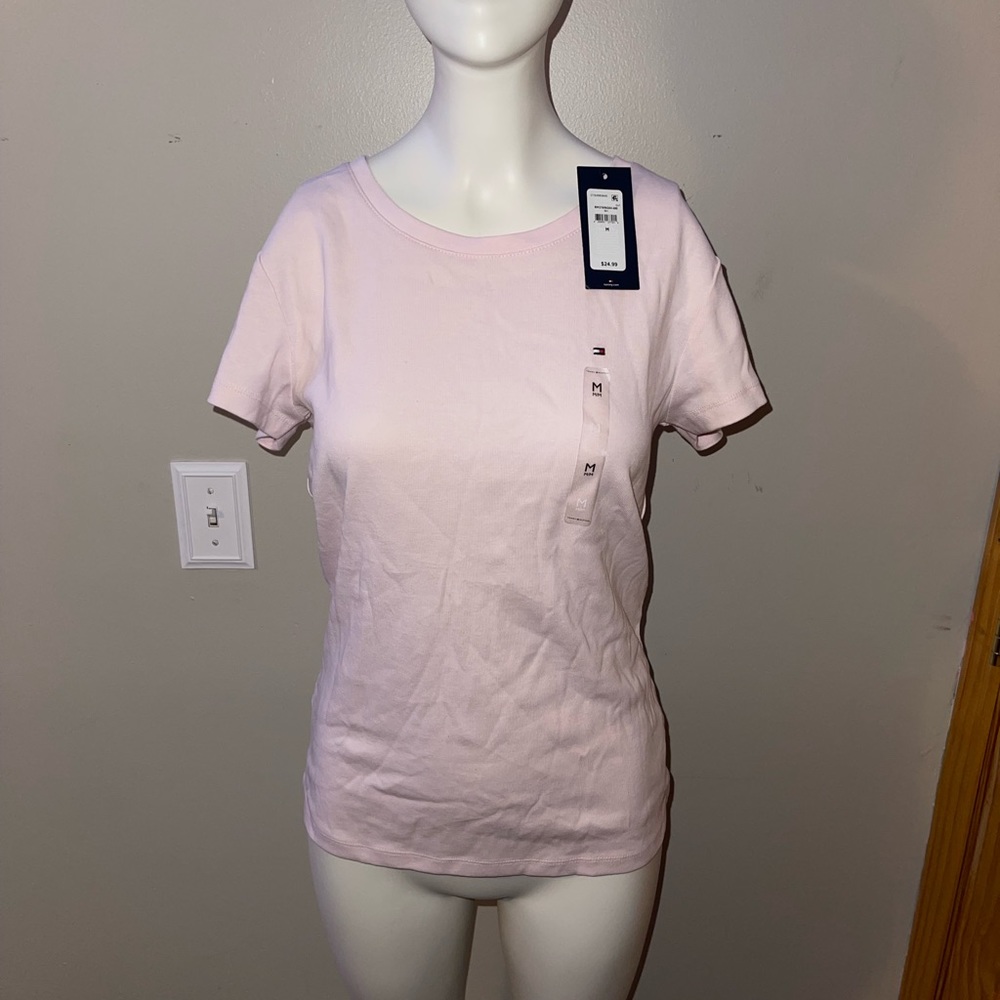 Light pink Tommy hilfiger T-shirt women’s size medium. New with tags. Never worn